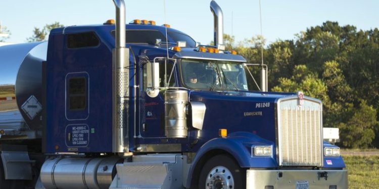 Trump says U.S. will impose new tariffs on heavy trucks, drugs and kitchen cabinets